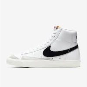 Nike Blazers High Top Sneaker. White with black Nike logo. Size 5